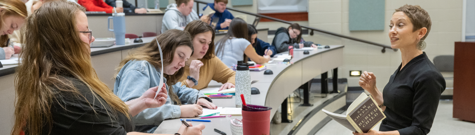 Photograph of Professor Susan Crisafulli speaking during a class at Franklin College