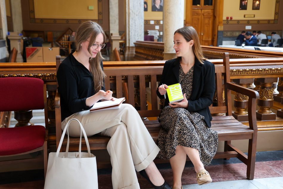 Photograph of Franklin College students and TheStatehouseFile.com staff members working at the Indiana Statehouse.